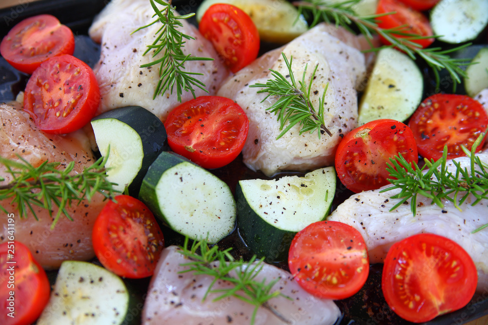 Zucchini, tomatoes and chicken ready to cook Zucchini, tomatoes and chicken ready to cook