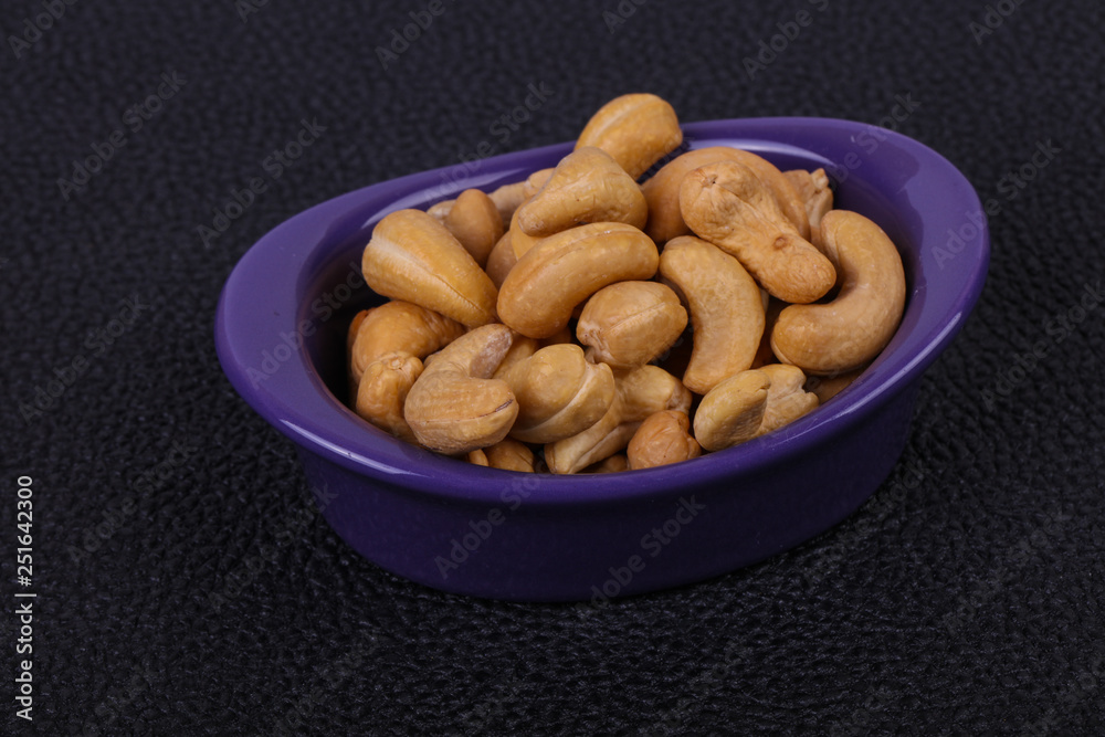 Cashew nuts heap in the bowl Cashew nuts heap in the bowl