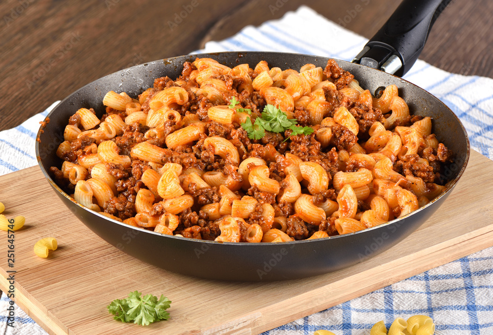 Makaroni po flotski russian national dish. Rustic style Makaroni po flotski russian national dish. Rustic style