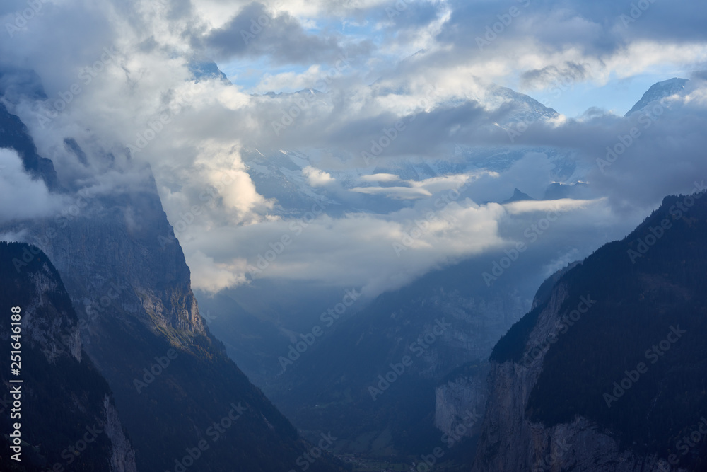 Cloudy view of the mountains in Lauterbrunnen valley in Switzerland.
