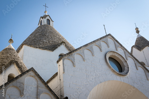 Church of Sant'Antonio in Alberobello (Italy). July 2017. Landscape format. photo