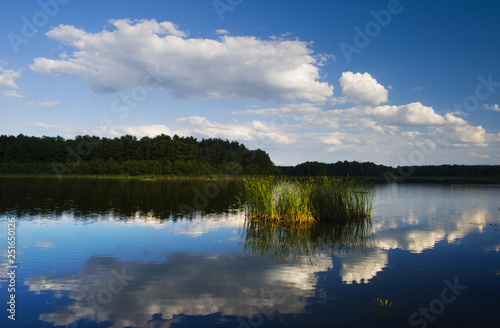 Lake and blue sky with clouds