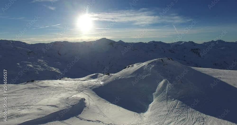 Ski resort in the Alps: sun, snow and mountains 
