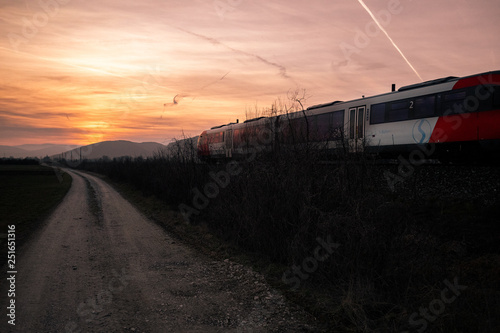 train on sunset landscape background
