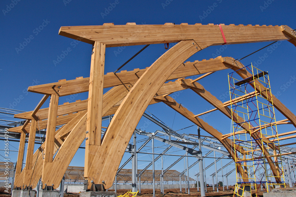 Roof construction of laminated veneer lumber. Building. Glued laminated  timber. Building. Construction site HR. Stock Photo | Adobe Stock