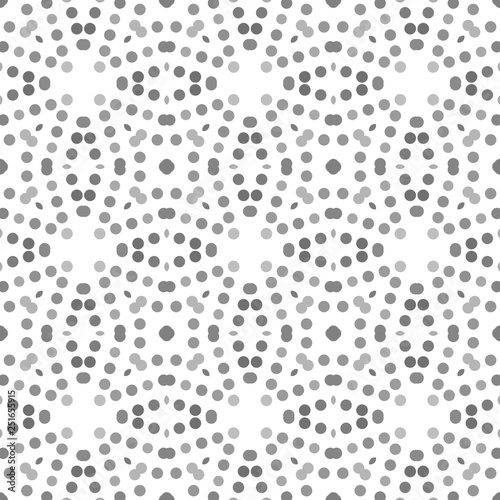 Seamless abstract pattern background with a variety of colored circles.