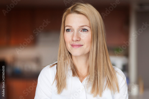 Wallpaper Mural Young woman having a little smile. Lot of empathy. A bit sad. Torontodigital.ca