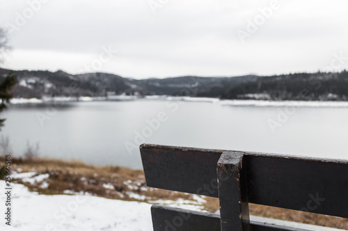 bench corner overlooking the lake out of focus blur