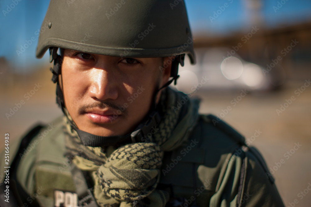 Portrait of a mid adult military policeman. Portrait of a mid adult military policeman.