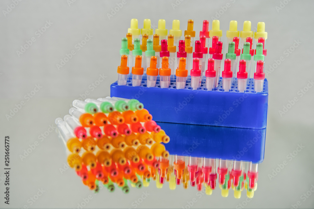Blood collection tubes are used in medicine as a sample vessel for the collection and preparation of blood samples. Focus in the background. Concept Health and Medicine Blood collection tubes are used in medicine as a sample vessel for the collection and preparation of blood samples. Focus in the background. Concept Health and Medicine