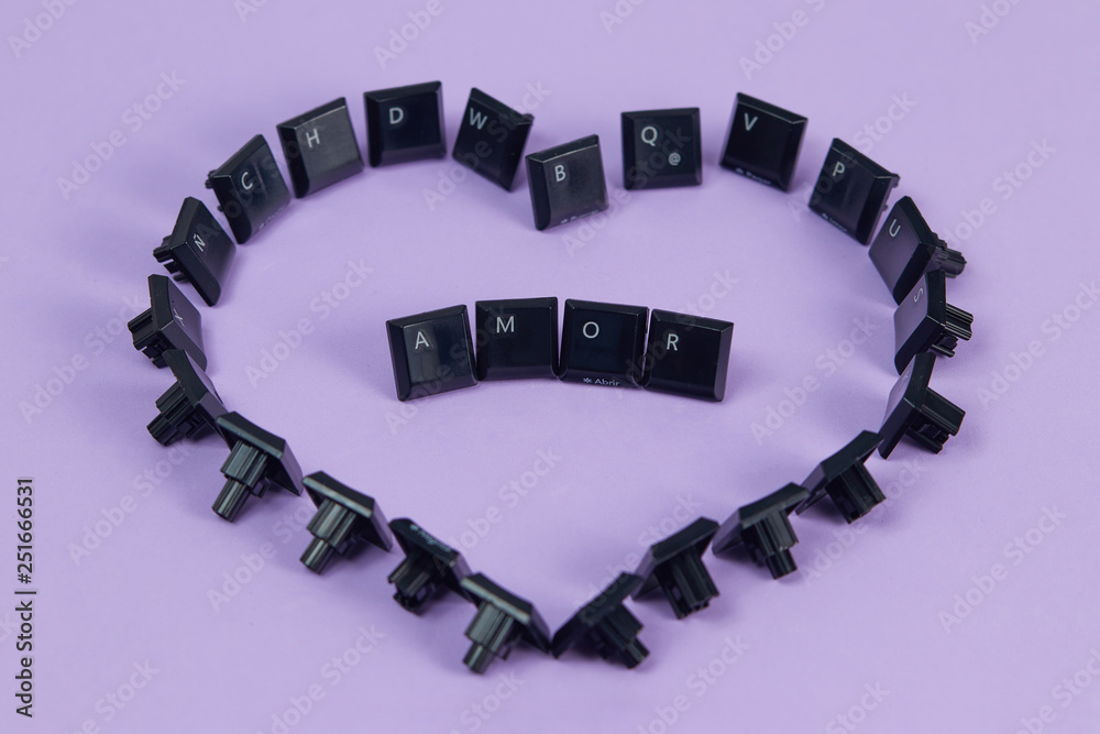 Fototapeta premium the word love in Spanish written with keyboard keys