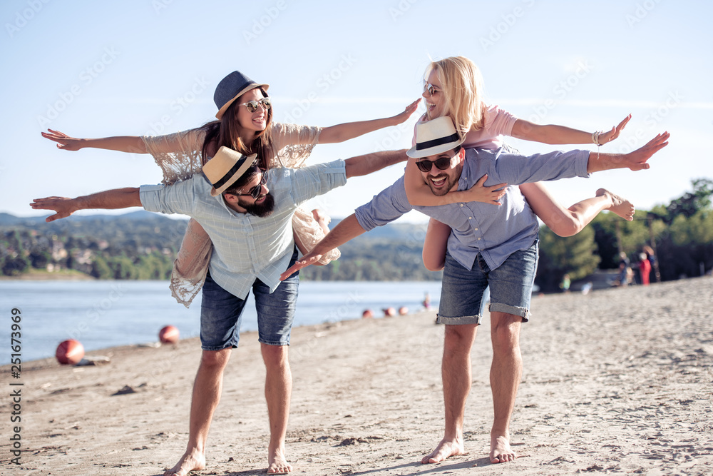 Group of happy young people on the beach Group of happy young people on the beach
