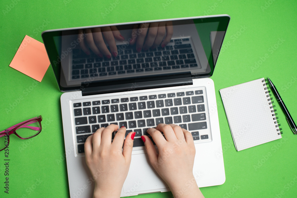 Laptop with notepad and pen Laptop with notepad and pen