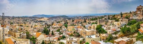 Cityscape of Nazareth with Basilica of the annunciation, Israel photo