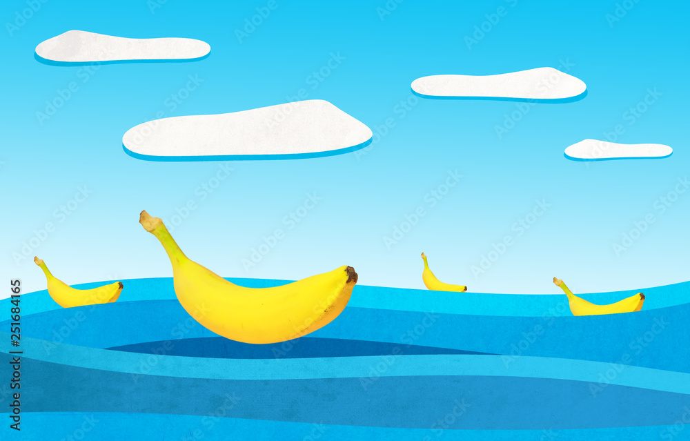 bananas swims on the painted sea on a sunny day