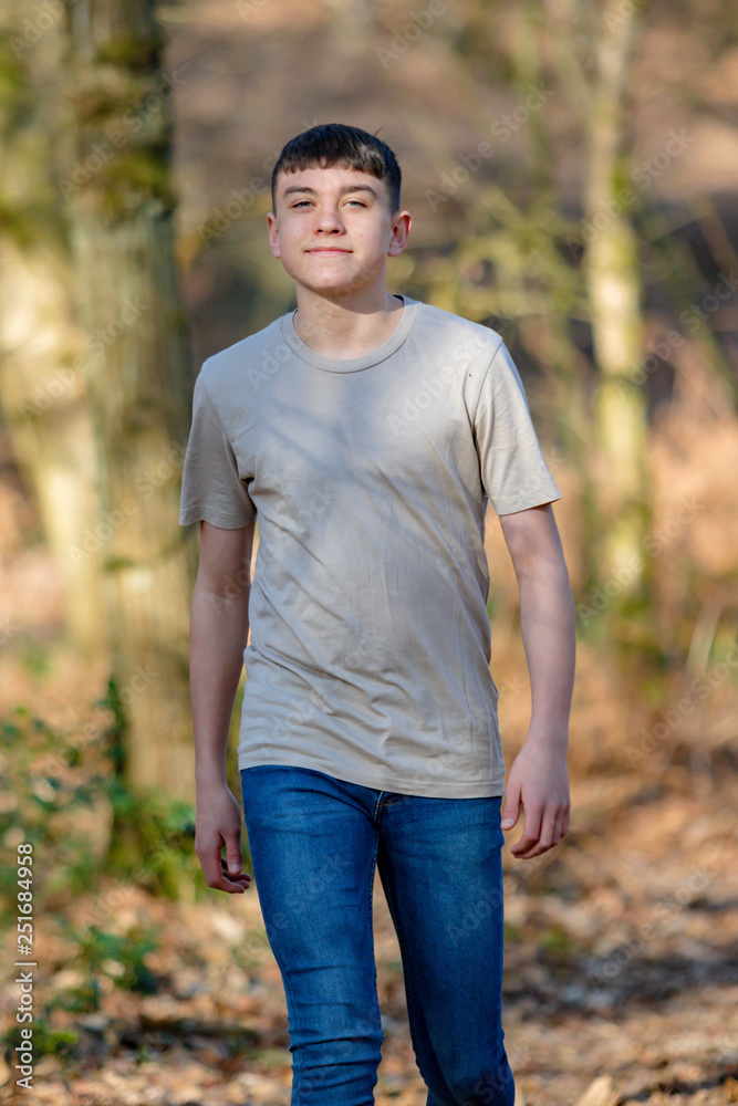 Teenage boy outside on a bright Spring day Teenage boy outside on a bright Spring day
