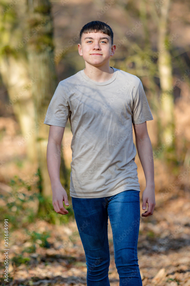 Teenage boy outside on a bright Spring day Teenage boy outside on a bright Spring day