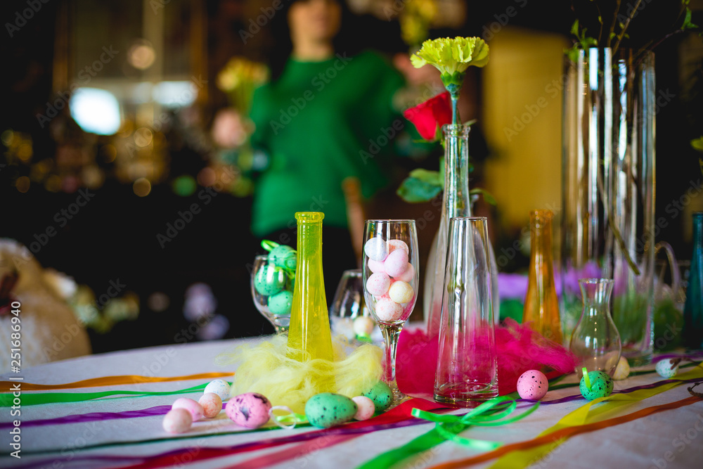 Decorated table with decorative elements for the day of Holy Easter