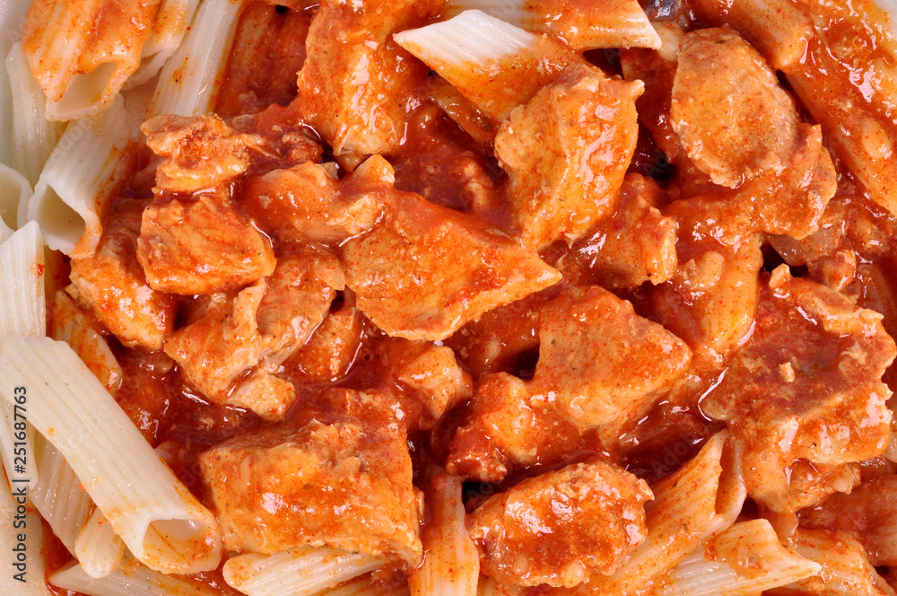 goulash with meat pieces and pasta close up goulash with meat pieces and pasta close up