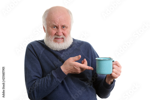 unhappy elderly man with cup of bad tea or coffee isolated on white