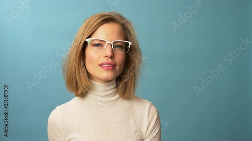 Funny model wears four types of glasses simultaneously photo