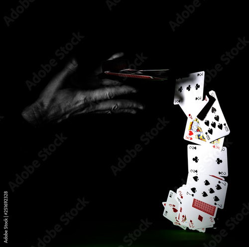 Playing Card Stack - On it's edge spread vertically - Creative Concept with De-Saturated (black and white) Hands