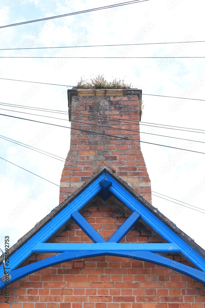 Light blue wooden barge boards from a Victorian almshouse. Light blue