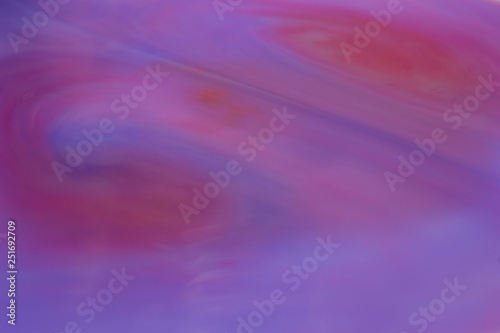 It is abstraction from bright colors of paints: pink, violet, blue, red.