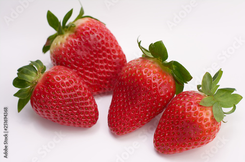 close up picture of fresh strawberries with white background