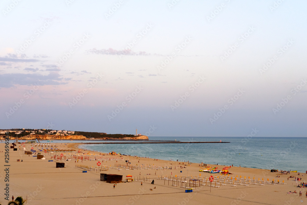 The end of the day in Algarve Beach at Summer time.