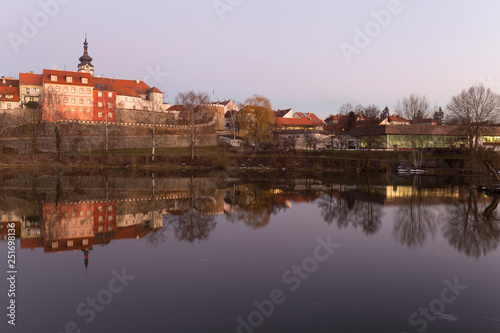Evening winter royal medieval Town Pisek with the Castle above the river Otava, Czech Republic 
