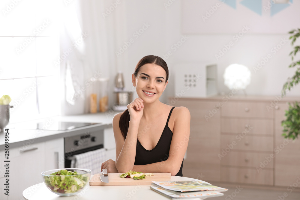 Young woman in fitness clothes preparing healthy breakfast at home Young woman in fitness clothes preparing healthy breakfast at home