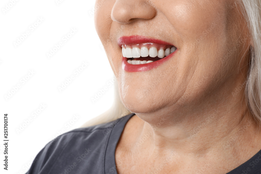 Obraz premium Smiling woman with perfect teeth on white background, closeup