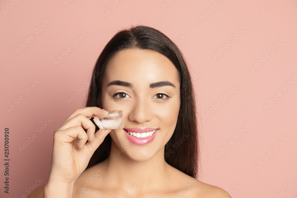 Young woman with ice cube on color background. Skin care Young woman with ice cube on color background. Skin care