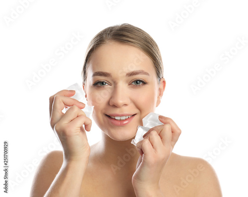 Young woman with ice cubes on white background. Skin care