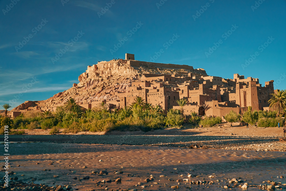 Close shot of historic unesco heritage ksar of Ait Ben Haddou in Morocco Africa with stones in the foreground