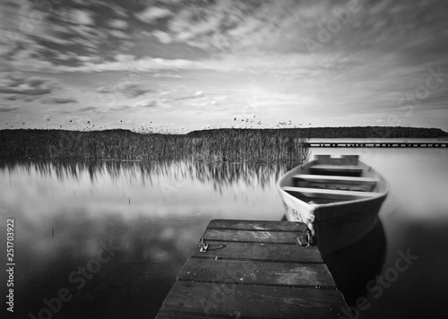 Boat on lake in black and white
