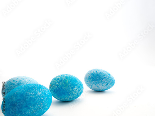 Blue Easter eggs on white background