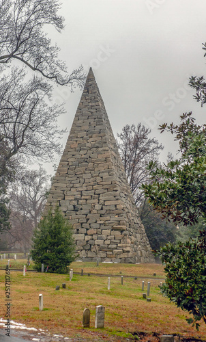 pyramid monument in a park cemetery