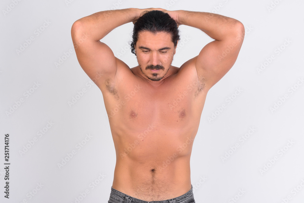 Shirtless handsome macho man with mustache flexing abs Shirtless handsome macho man with mustache flexing abs