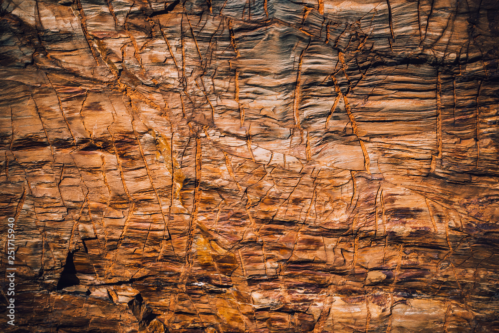 Naklejka premium Structural stone rock as background