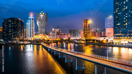 Fotografie Macau cityscape at night, all hotel and tower are colorful lighten up with blue sky, Macau, China