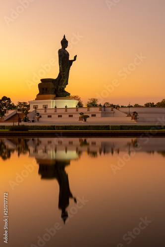 Big Buddha statue on sunset sky