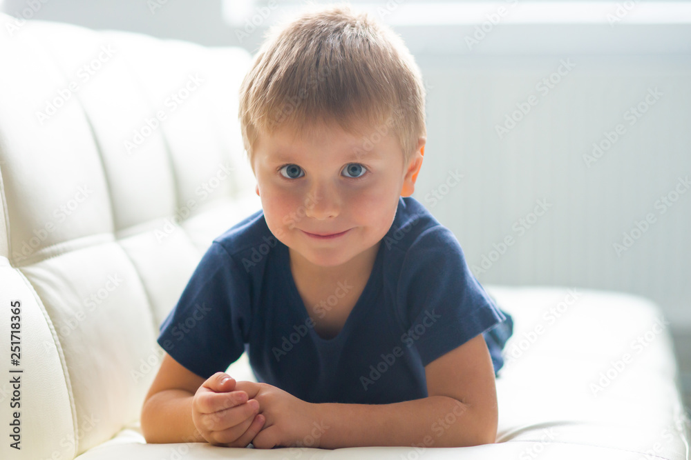 Portrait of happy smiling boy. Attractive kid at home. Portrait of happy smiling boy. Attractive kid at home.