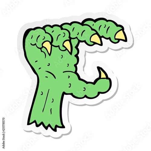 sticker of a cartoon monster claw