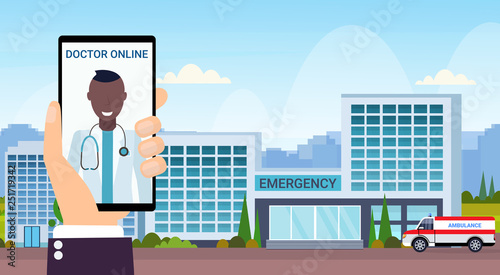 hand holding smartphone mobile application doctor online consultation concept modern hospital building with ambulance car medical clinic exterior cityscape flat horizontal