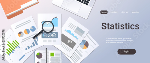 analysis financial results finance business chart graph diagram statistic concept top angle view desktop laptop paper documents report office stuff horizontal copy space