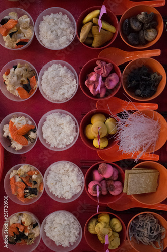 Food offerings on a table to appease the wandering spirits during the Chinese Hungry Ghost Festival 