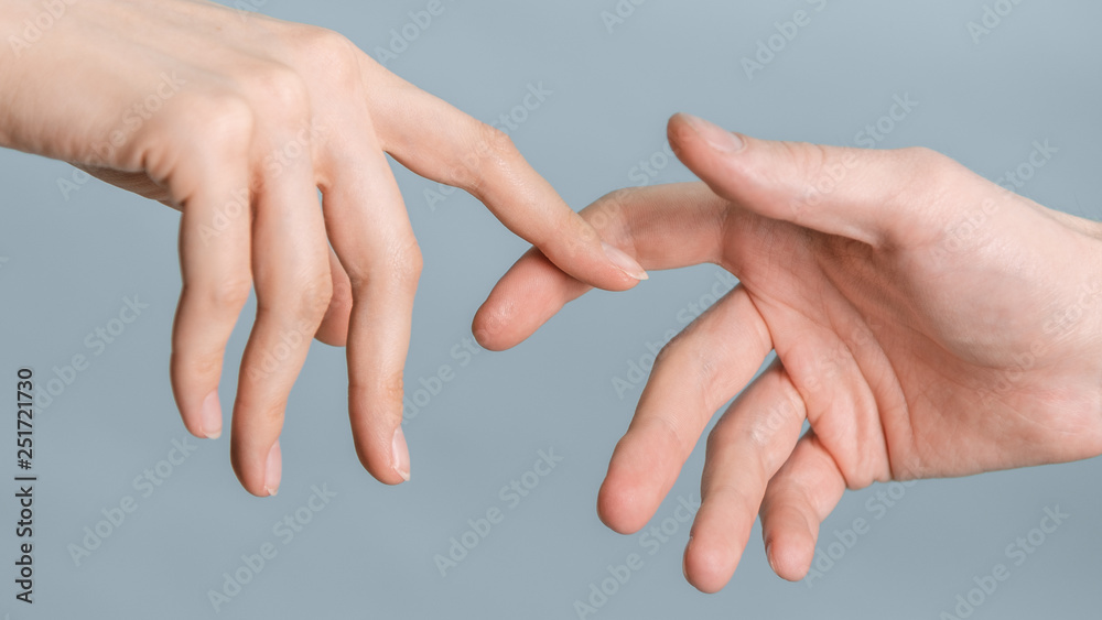 Hands of man and woman touching to each other, people relationship