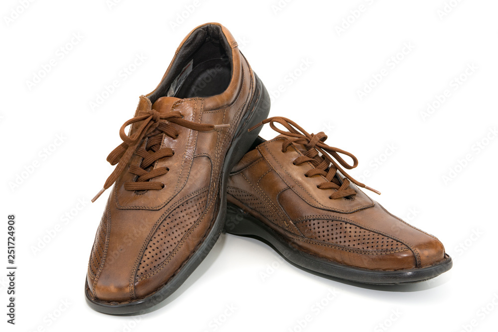 Brown, genuine leather men's shoes with laces on the isolate Brown, genuine leather men's shoes with laces on the isolate